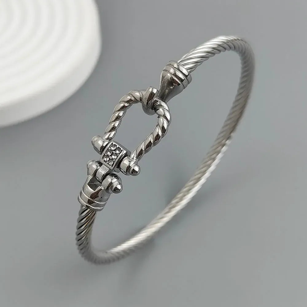 New steel wire button pattern horseshoe gold-plated stainless steel bracelet 18K, high quality waterproof couple bracelet, wife