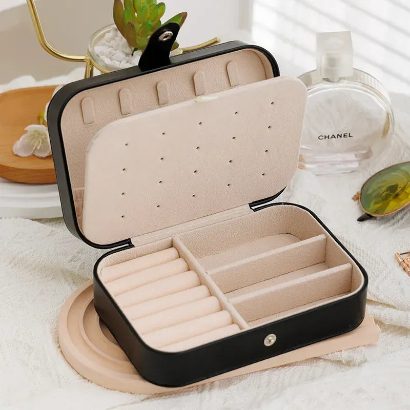 Caja portátil de cuero para guardar joyas