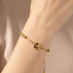 Pulseira de flor dourada
