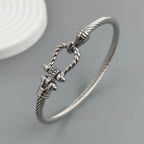 New steel wire button pattern horseshoe gold-plated stainless steel bracelet 18K, high quality waterproof couple bracelet, wife