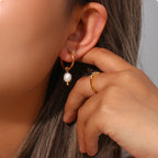 Brincos de pérola opala